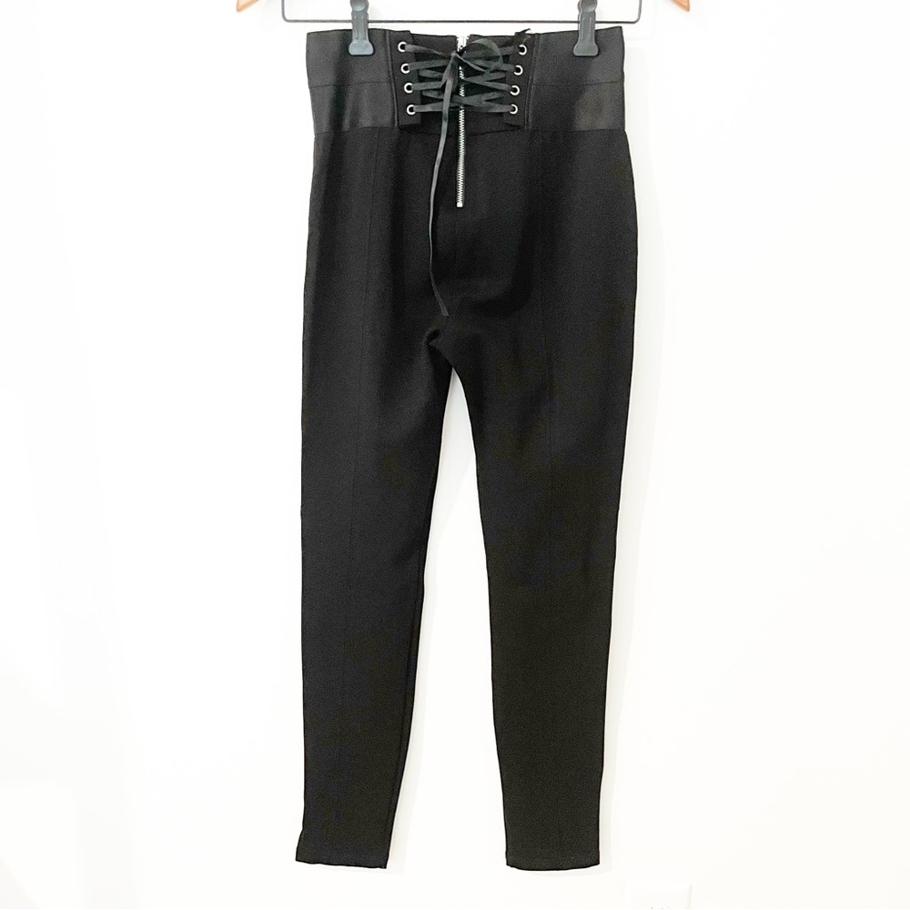 Bebe Women’s Black Sleek Tights with Corset Closure on Back.